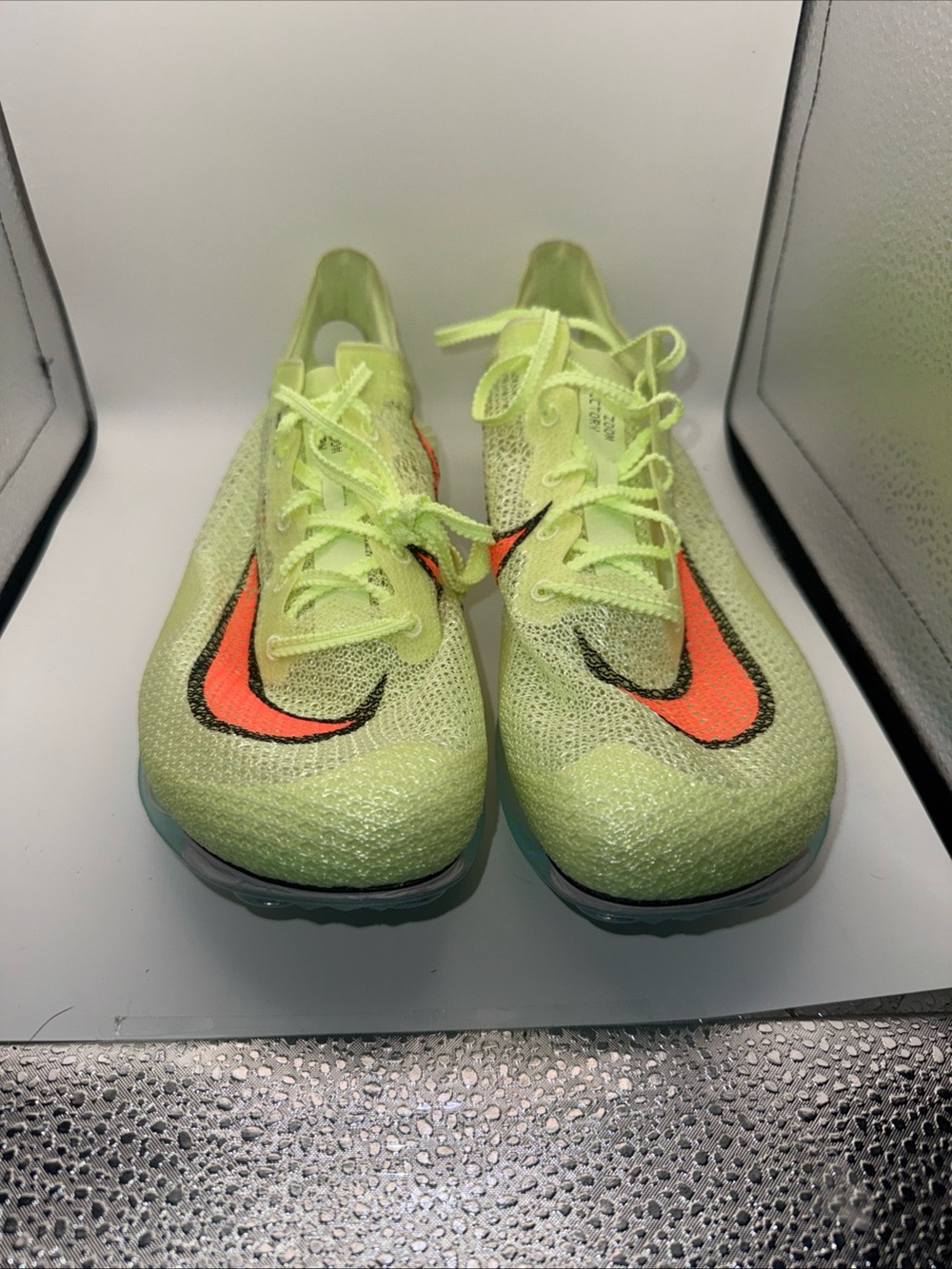 Nike men’s Neon Yellow Flyknit Track spikes Sneakers with Orange Swoosh